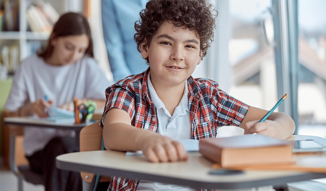 smiling student in classroom