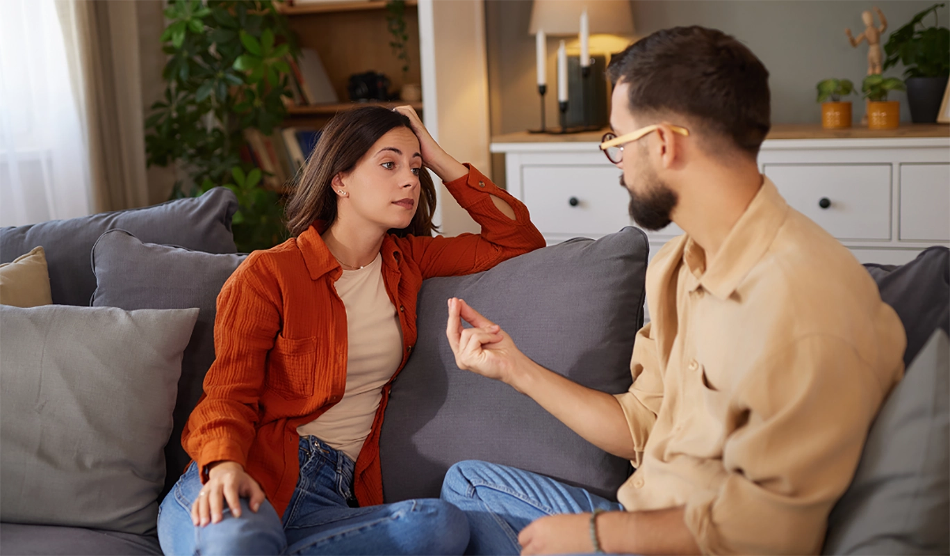man and woman in discussion