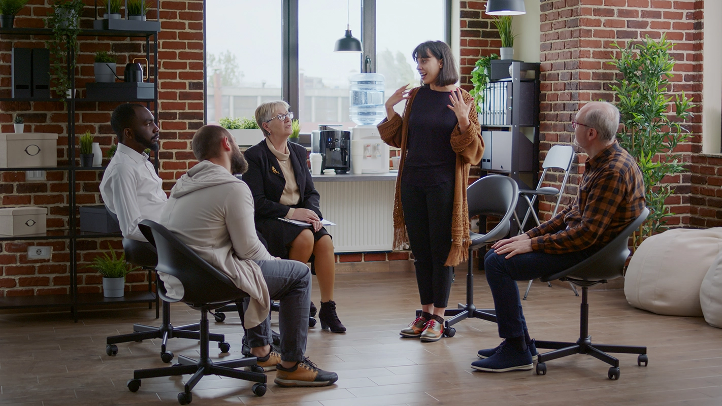 group of adults in conversation